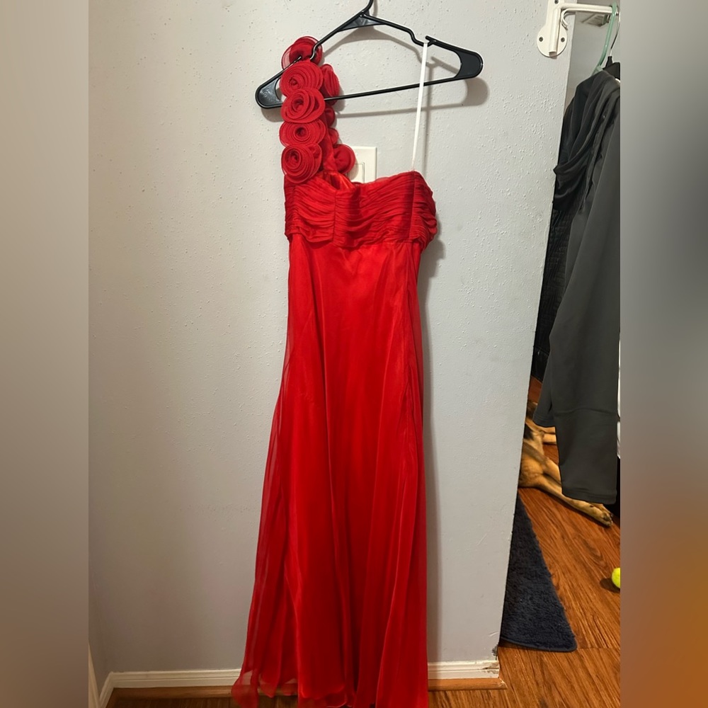 Red one shoulder ball gown